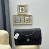 Chanel 2020s diamond-quilted double-chain Shoulder Bag 
40 x 25 x 12 cm