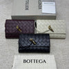 Bottega Veneta 
Andiamo Pouch 
19 x 12.5 x 2 cm