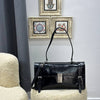 Prada
Medium leather handbag 
32 x 16.5 x 10 cm