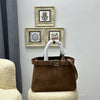 Prada buckle small suede bag
32 x 23 x 11 cm