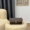 Louis Vuitton
Pochette Camille 
20.5 x 11 x 6 cm