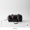 Prada Dangle medium leather top-handle bag
30 x 14 x 13.5 cm